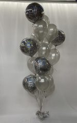 Disco balloon with Silver Latex Balloon Bouquet Inflated With Helium and attached to weight